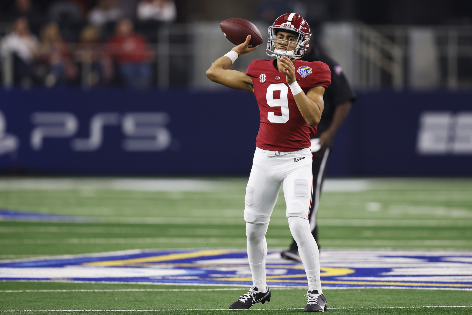 Bryce Young receiving help from Mac Jones as rookie